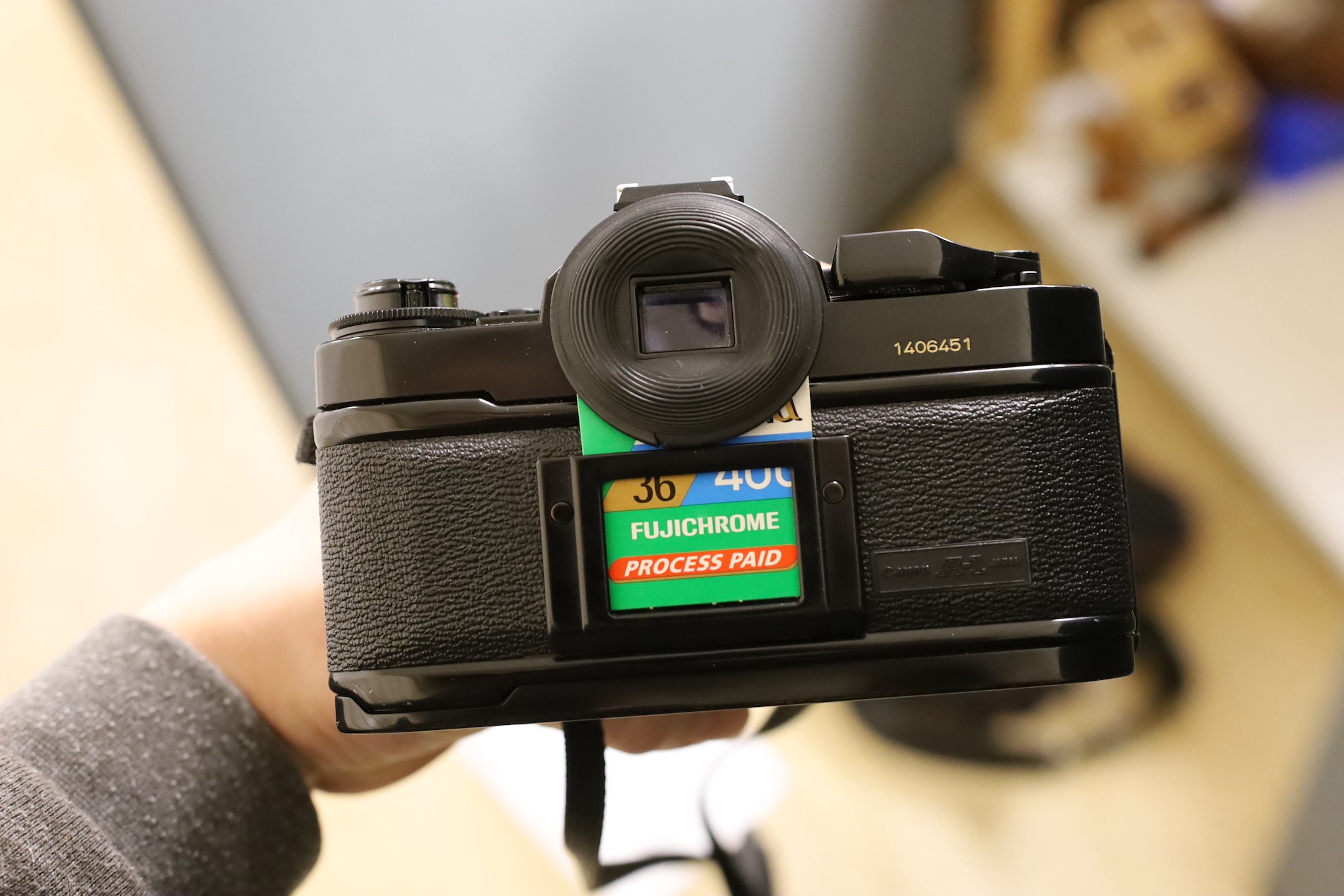 A Canon EF 35mm SLR camera with a 50mm 1:1.4 lens, together with a Susis rapid tripod stand and two other lenses